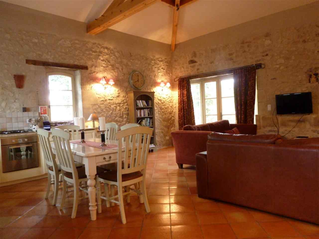 resized-2349823-Le Fourneau, Living room, French doors opening onto terrace.JPG